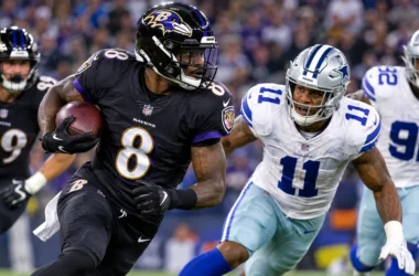 Ravens vs Cowboys Score & Recap action shot during NFL game in Rio